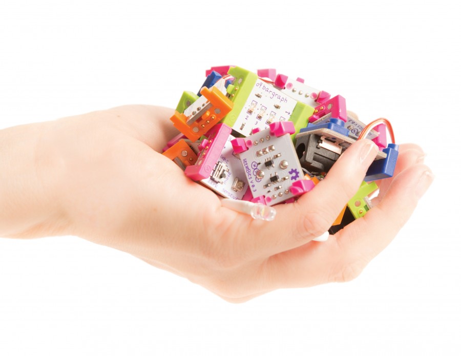 LittleBits are modular electronic bits LittleBits electronic bits on a hand